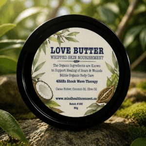 Love Butter whipped skin nourishment container on mossy rocks