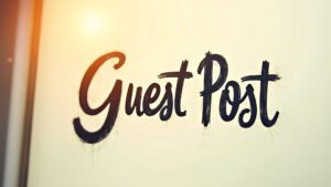 Stylized 'Guest Post' text on a sunlit wall