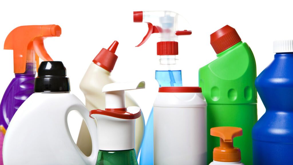 Various colourful household cleaning product bottles